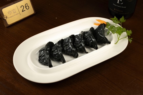 M95. GYOZA DE CERDO Y JUGO DE SETAS