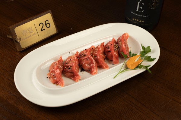 M94. GYOZA DE GAMBAS CERDO Y CEBOLLINO NIRO